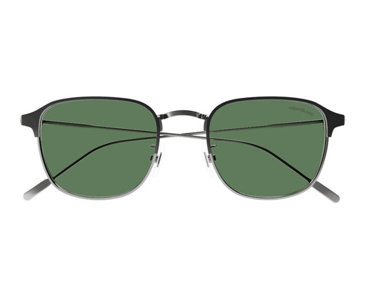Sunglasses with green lenses and black frame on a white background