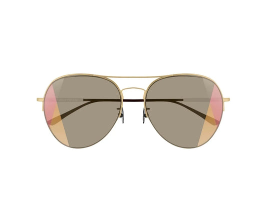 Aviator sunglasses with gold frame and dark lenses on a white background