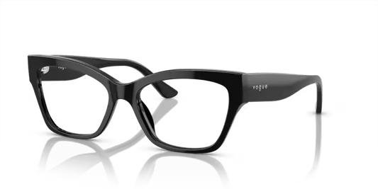 Black eyeglasses with 'vega' branding on a reflective surface