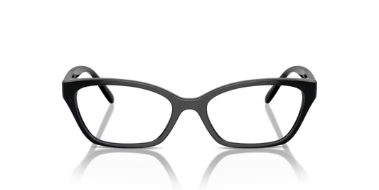 Black cat-eye glasses on a reflective surface with a black background