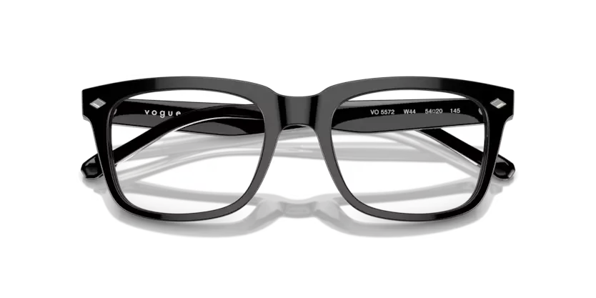 Black sunglasses with 'Vogue' branding on a white background