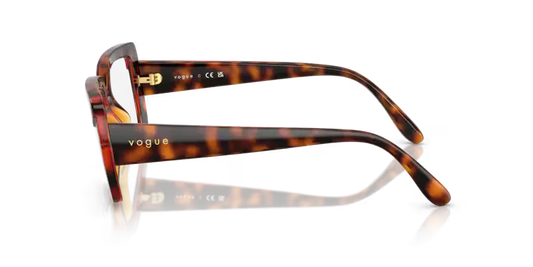 Tortoiseshell sunglasses with reflective lenses on a clear background