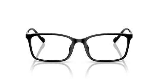 Black-framed glasses on a reflective surface with a black background