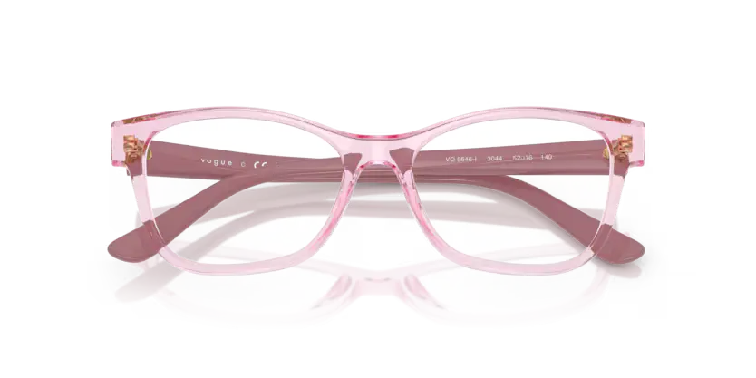 Pink eyeglasses with decorative elements on a white background