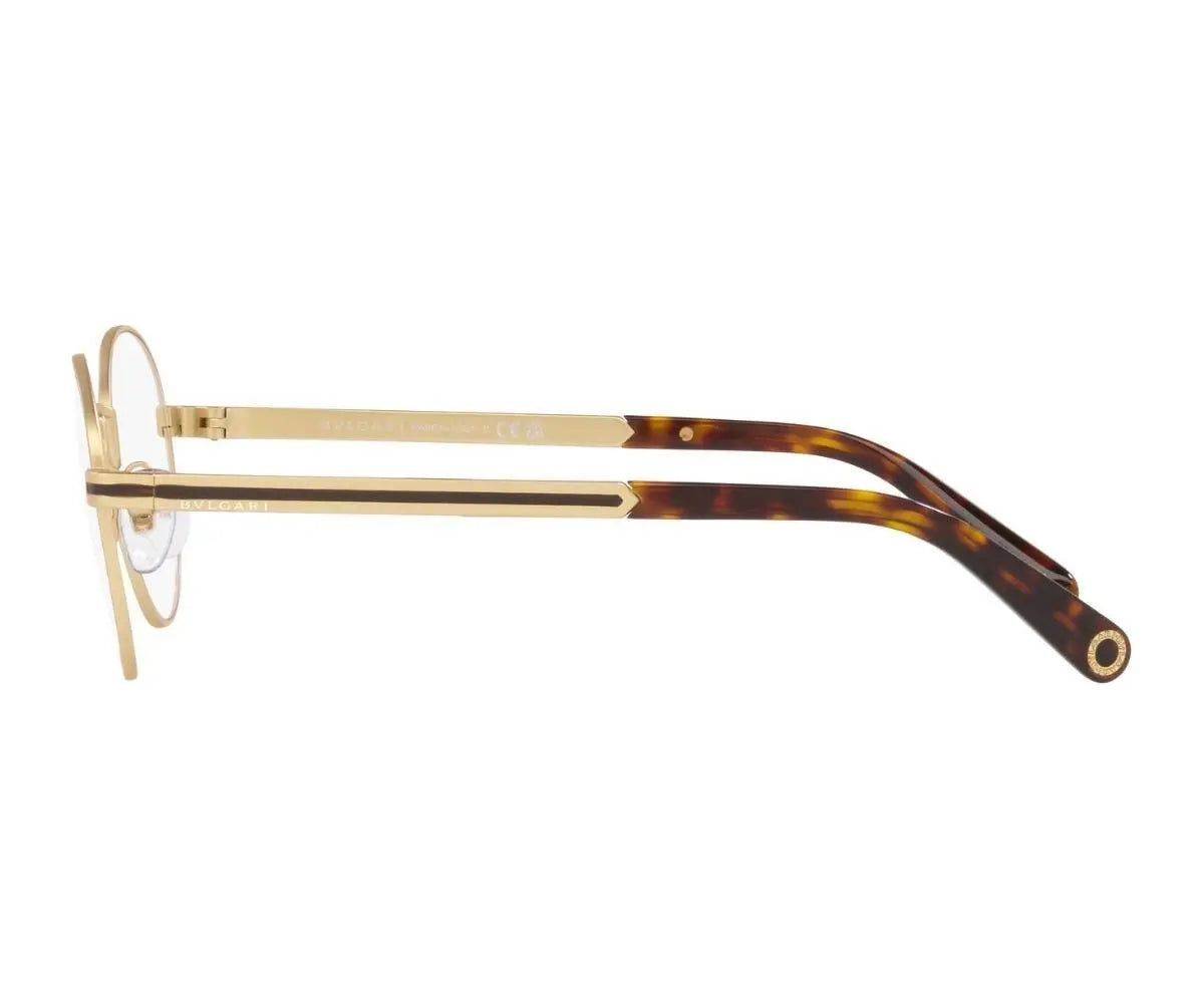 Gold and tortoiseshell eyeglasses on a white background