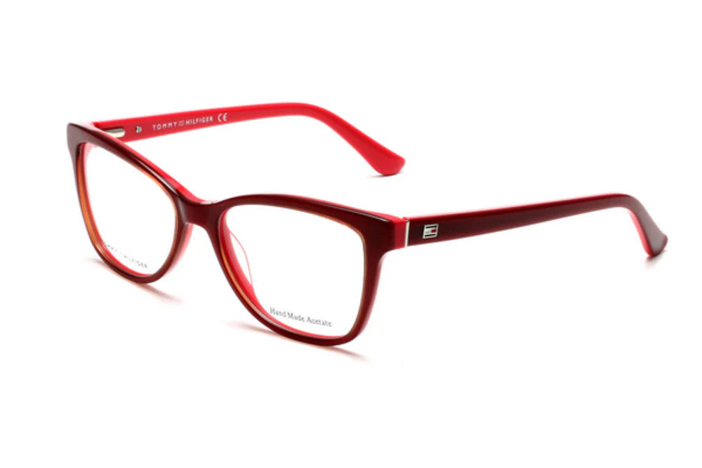 Red eyeglasses on a white background