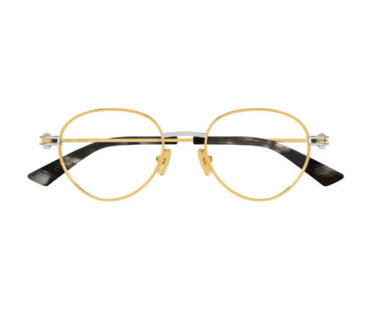 Gold-rimmed eyeglasses on a white background