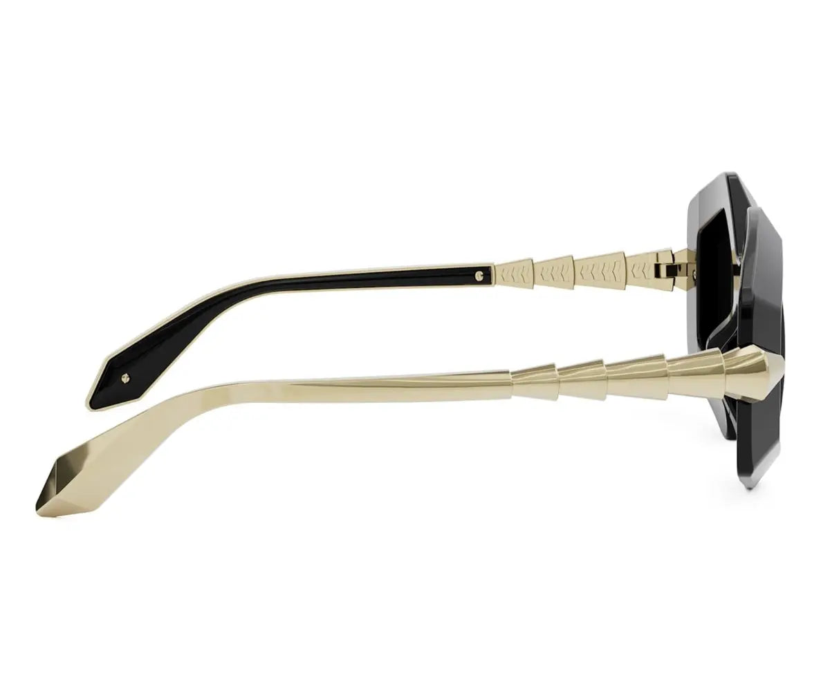 Sunglasses with gold frames and black lenses on a white background