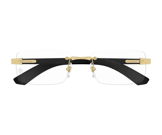 Black and gold eyeglasses on a white background