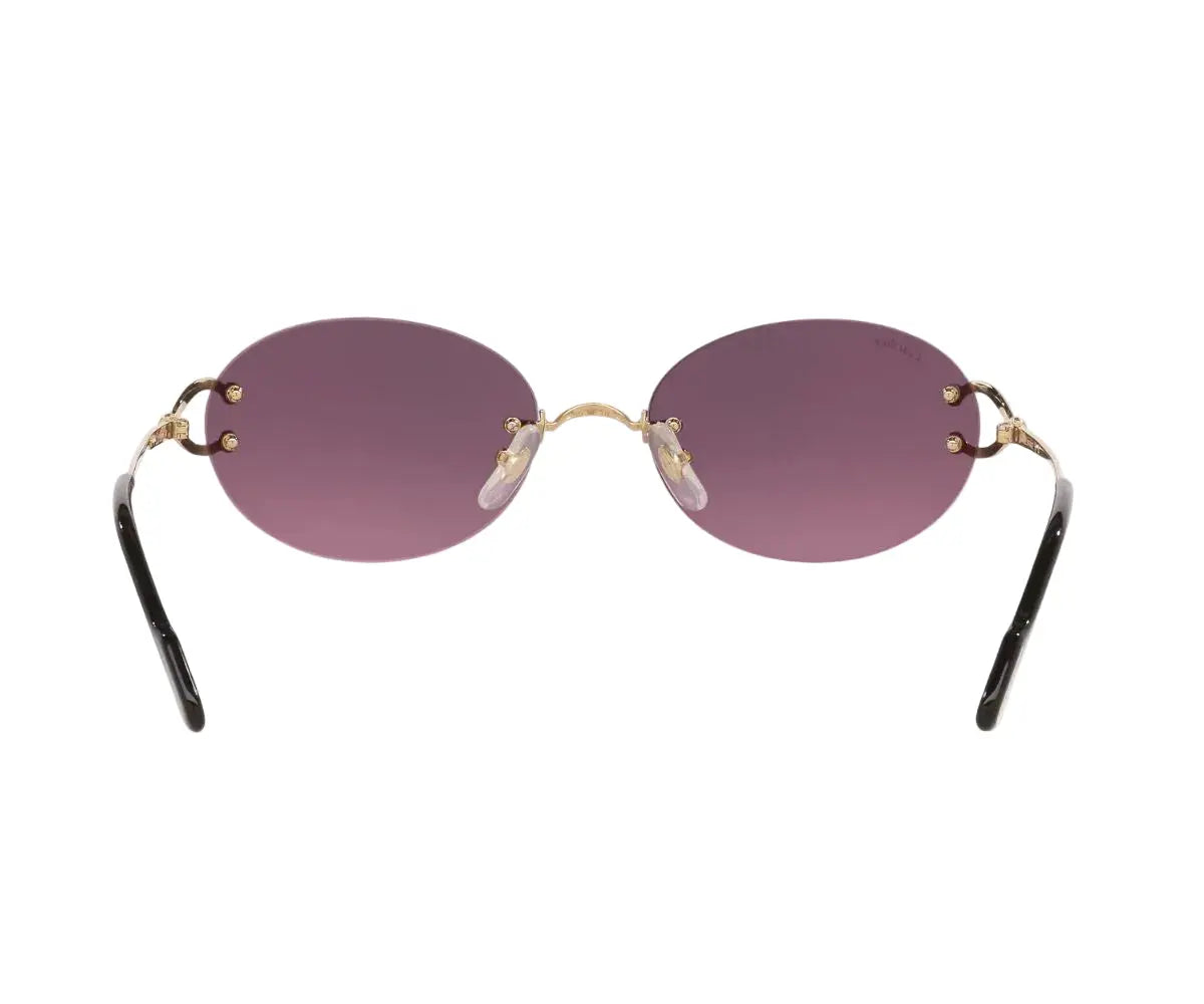 Sunglasses with purple lenses and gold frames on a white background