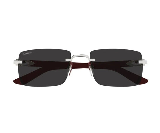 Sunglasses with dark lenses and thin frame on a white background