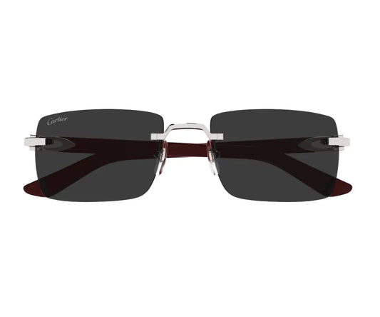 Sunglasses with dark lenses and silver frame on a white background