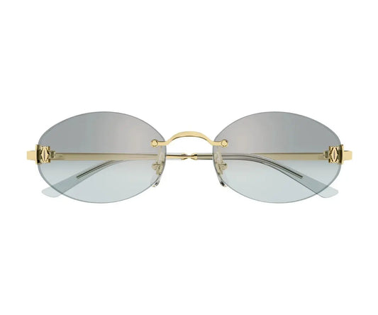 Gold-framed sunglasses with clear lenses on a white background