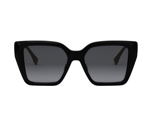Black sunglasses with dark lenses on a white background