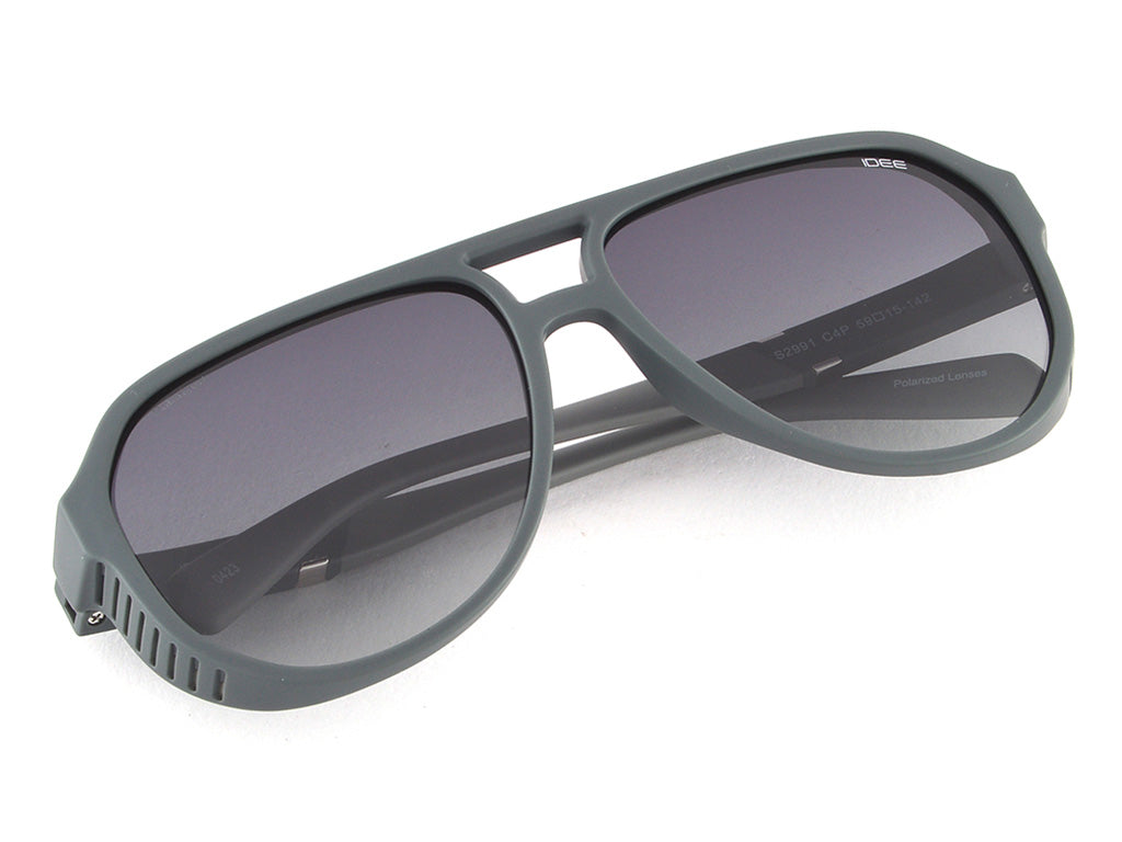 Gray sunglasses with dark lenses on a white background