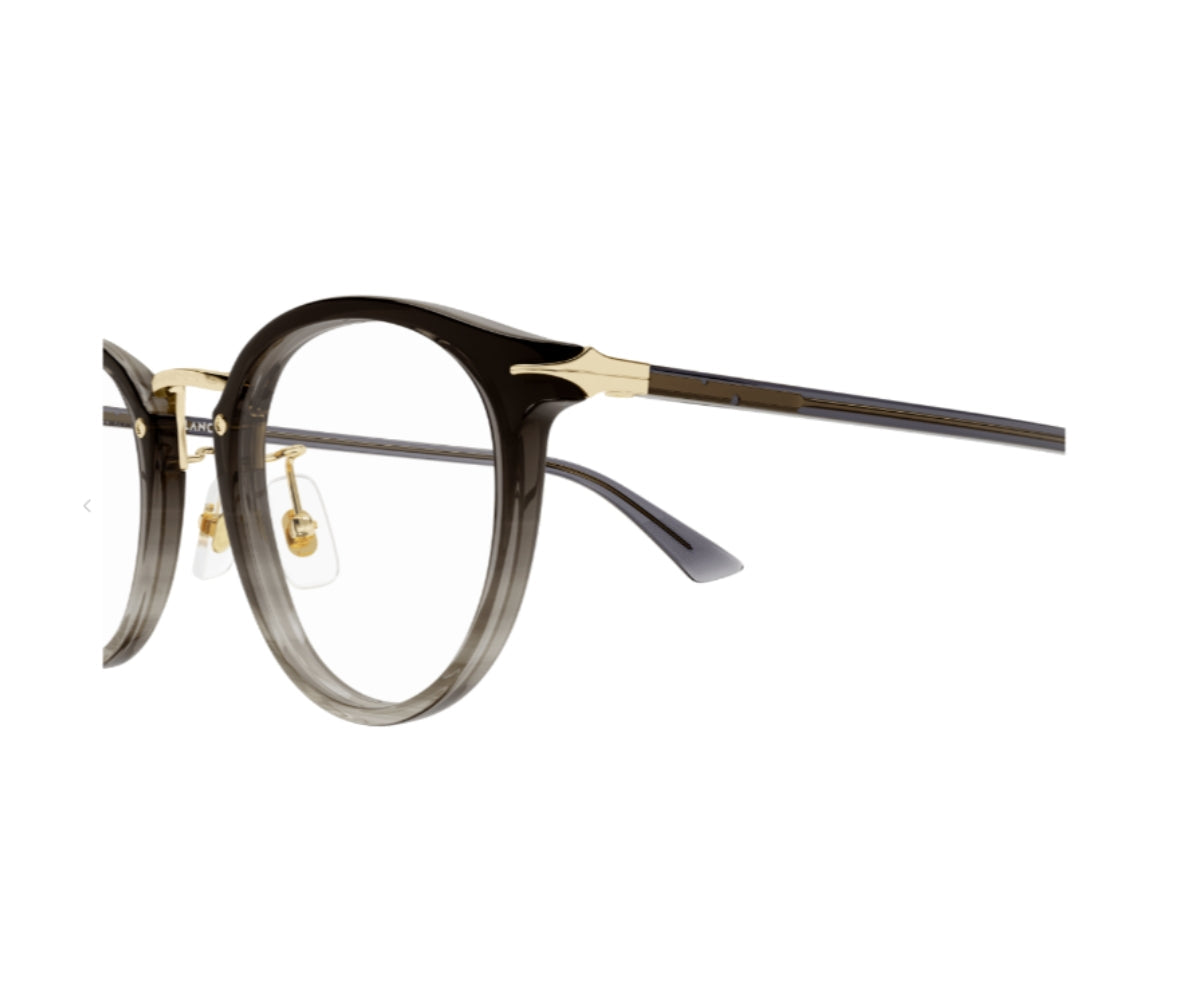 Round eyeglasses with black and gold frame on a white background