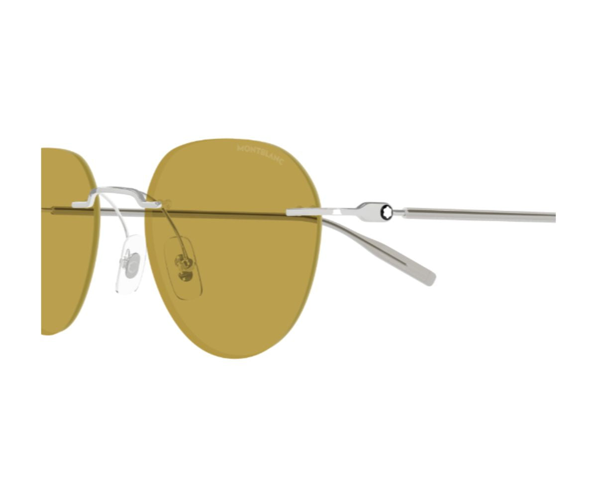 Sunglasses with yellow lenses and silver frame on a white background