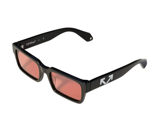 Black sunglasses with red lenses on a white background