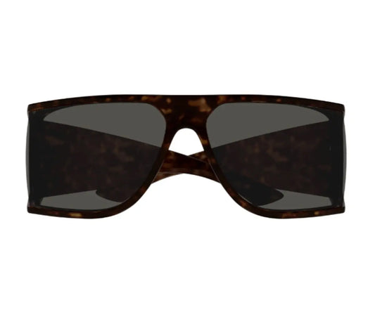Sunglasses with tortoiseshell frame and dark lenses on a white background