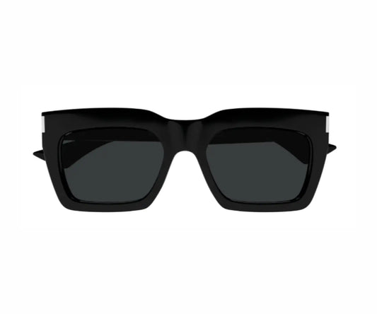 Black sunglasses with dark lenses on a white background