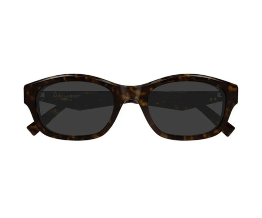 Sunglasses with tortoiseshell frame and dark lenses on a white background