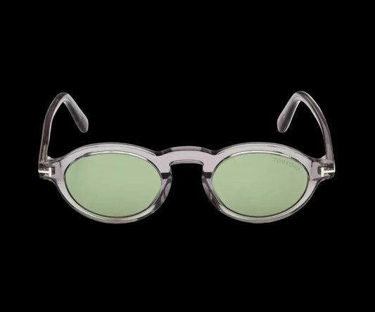 Sunglasses with green lenses and gray frames on a white background