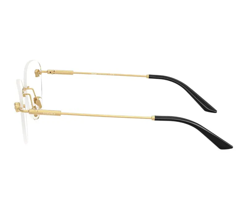 Pair of eyeglasses with gold frames and black accents on a white background