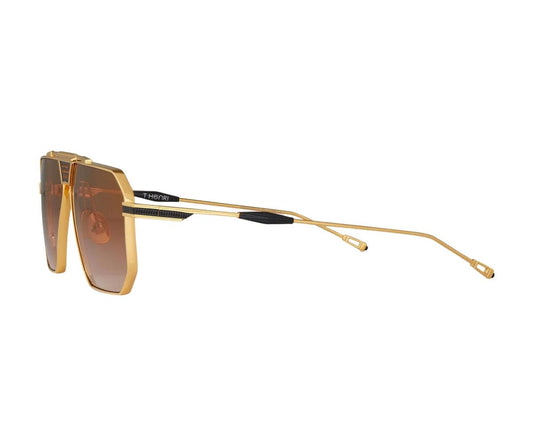 Gold sunglasses with brown lenses on a white background