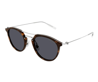 Sunglasses with tortoiseshell frame and dark lenses on a white background