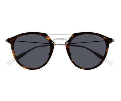 Sunglasses with tortoiseshell frame and dark lenses on a white background
