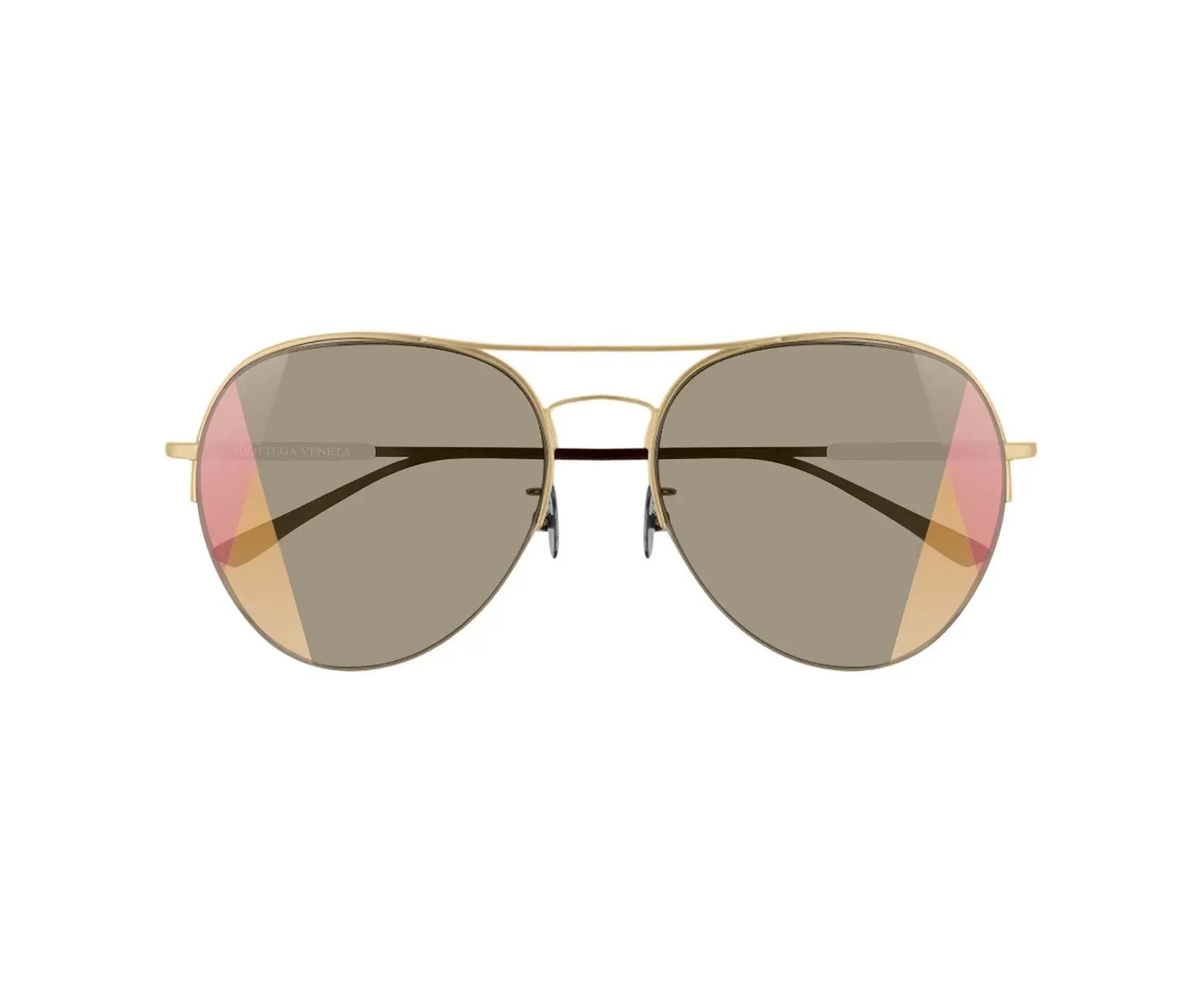 Aviator sunglasses with gold frame and dark lenses on a white background