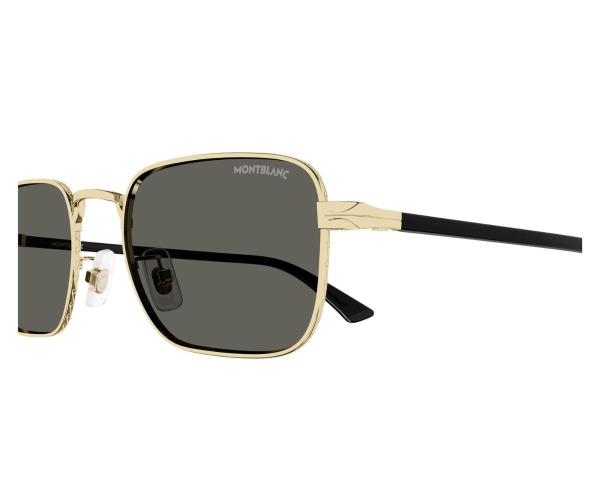 Gold-framed sunglasses with dark lenses on a white background
