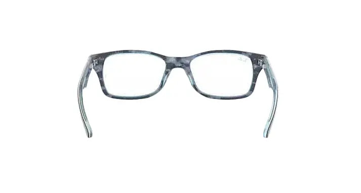 Blue eyeglasses on a light gray background