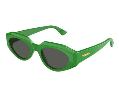 Green sunglasses with a gold logo on a white background