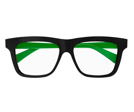 Black-framed glasses with green accents on a white background
