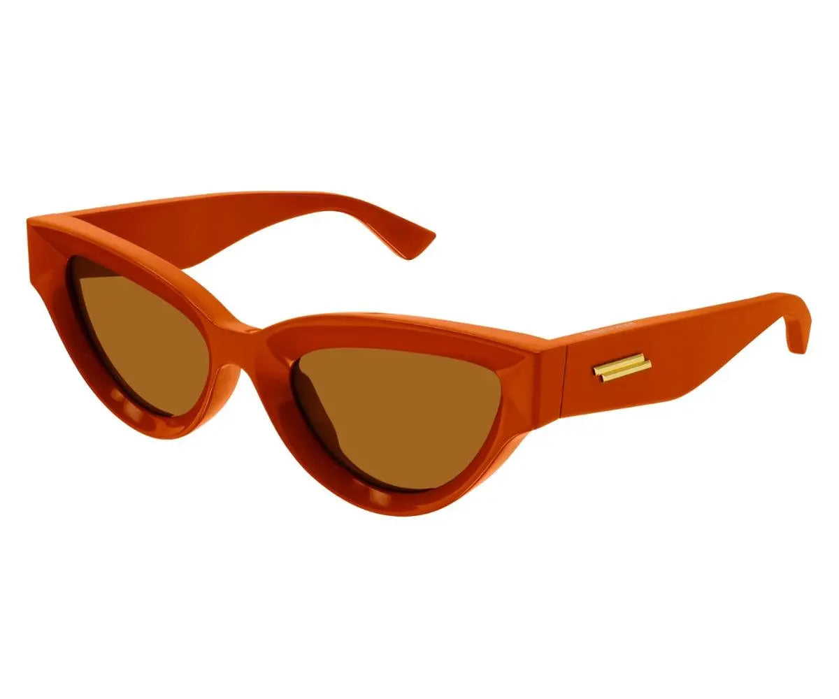 Orange cat-eye sunglasses with brown lenses on a white background