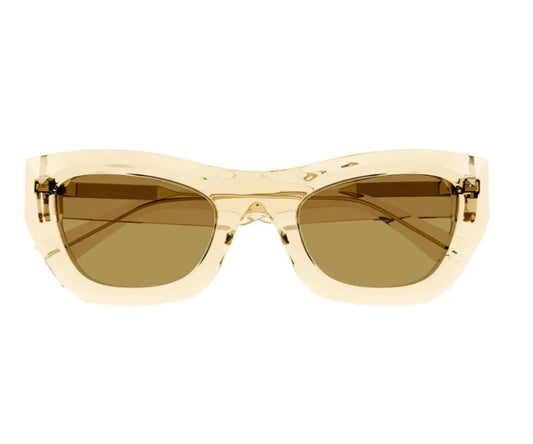 Gold-framed sunglasses with brown lenses on a white background