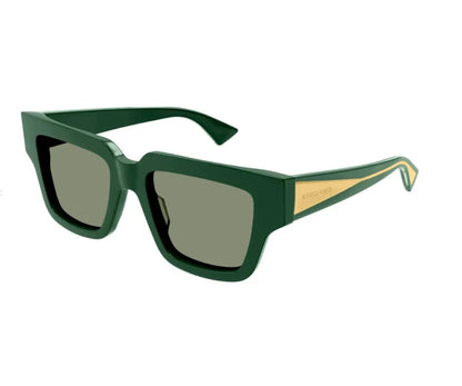 Green sunglasses with a gold accent on a white background