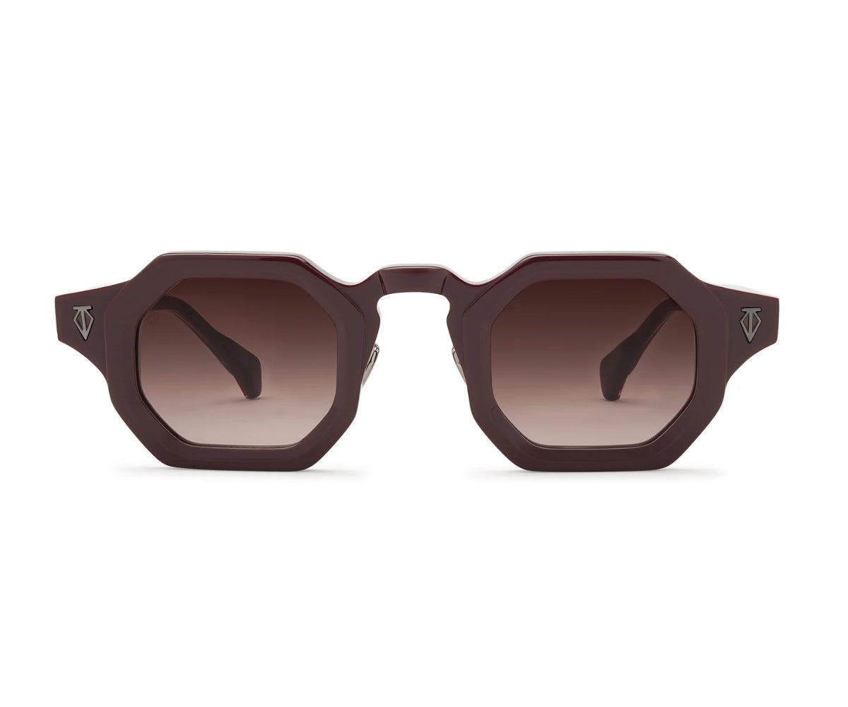 Brown sunglasses with gradient lenses on a white background