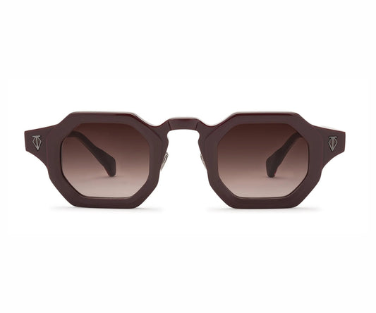 Brown sunglasses with gradient lenses on a white background