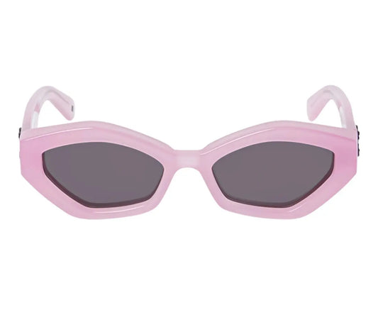 Pink sunglasses with dark lenses on a white background