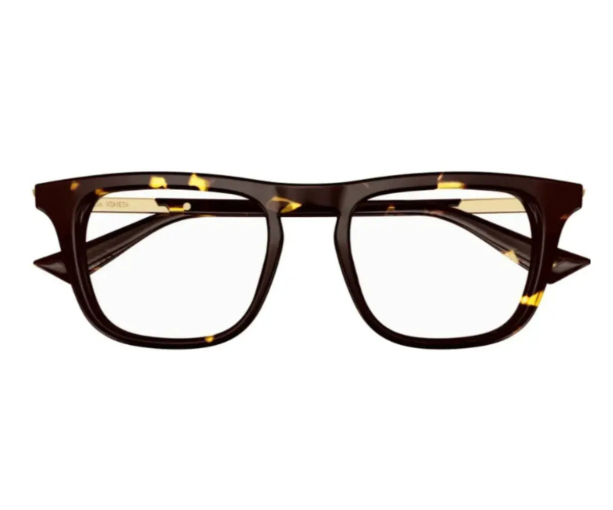 Brown tortoiseshell glasses on a white background
