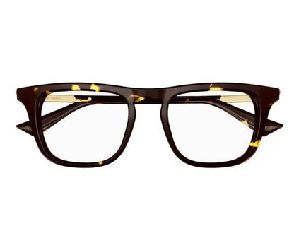 Brown tortoiseshell glasses on a white background