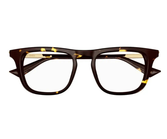 Brown tortoiseshell glasses on a white background