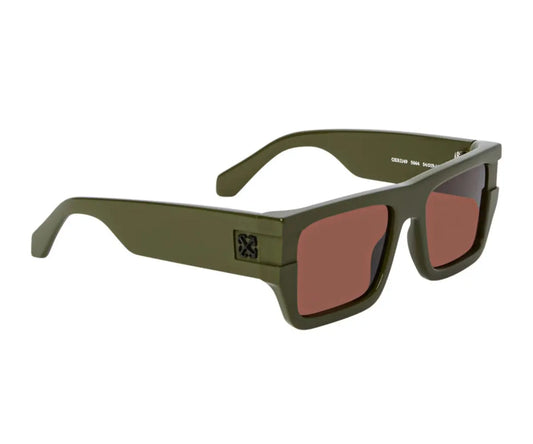 Green sunglasses with red lenses on a white background
