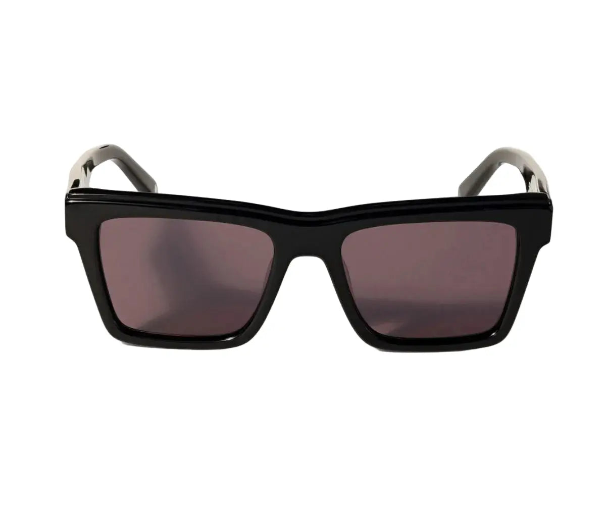 Black sunglasses with dark lenses on a white background
