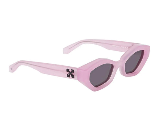 Pink sunglasses with dark lenses on a white background