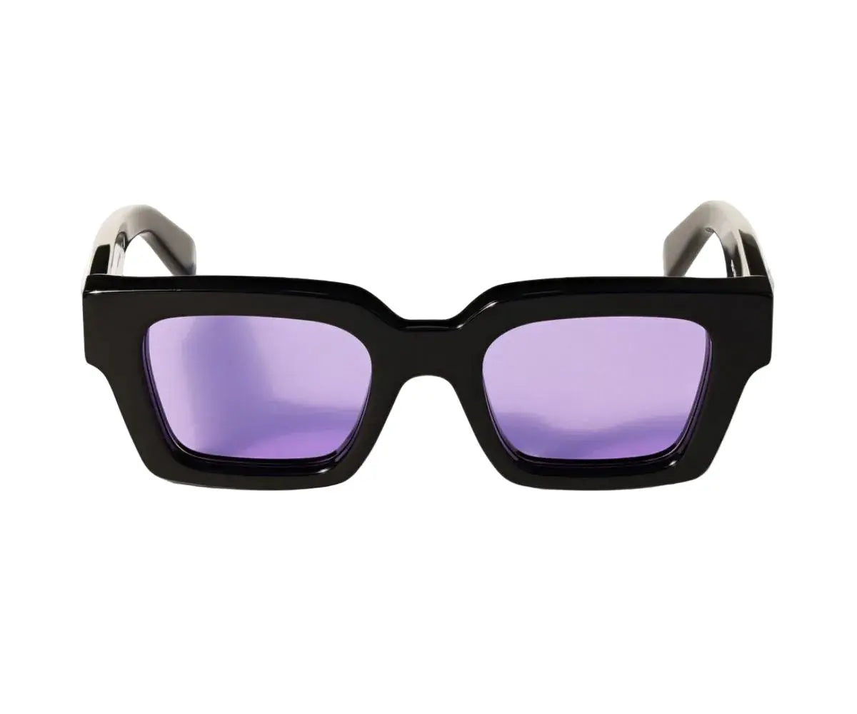Black sunglasses with purple lenses on a white background