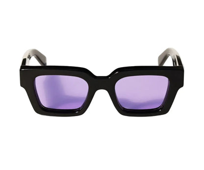 Black sunglasses with purple lenses on a white background