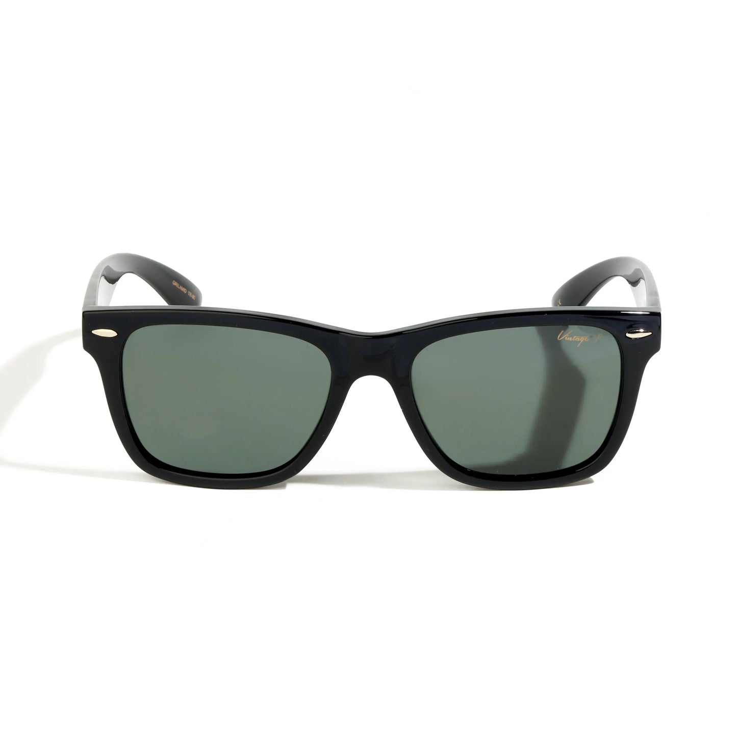 Black sunglasses with gold accents on a white background